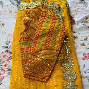 Vibrant Indian Yellow and Red Embellished Saree